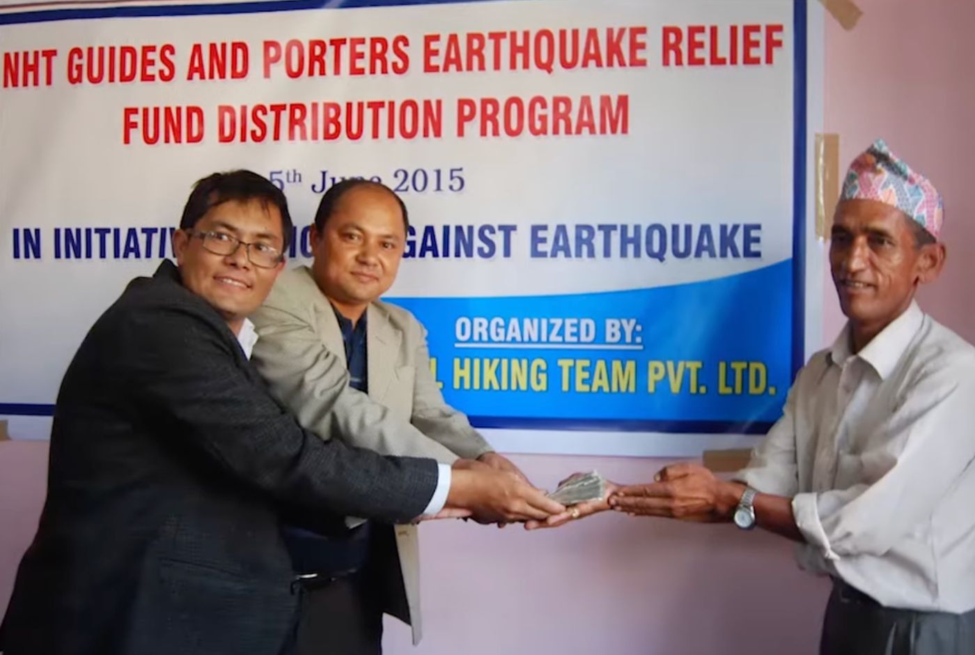 Nepal Hiking Team distributing earthquake relief funds to guides and porters in 2015