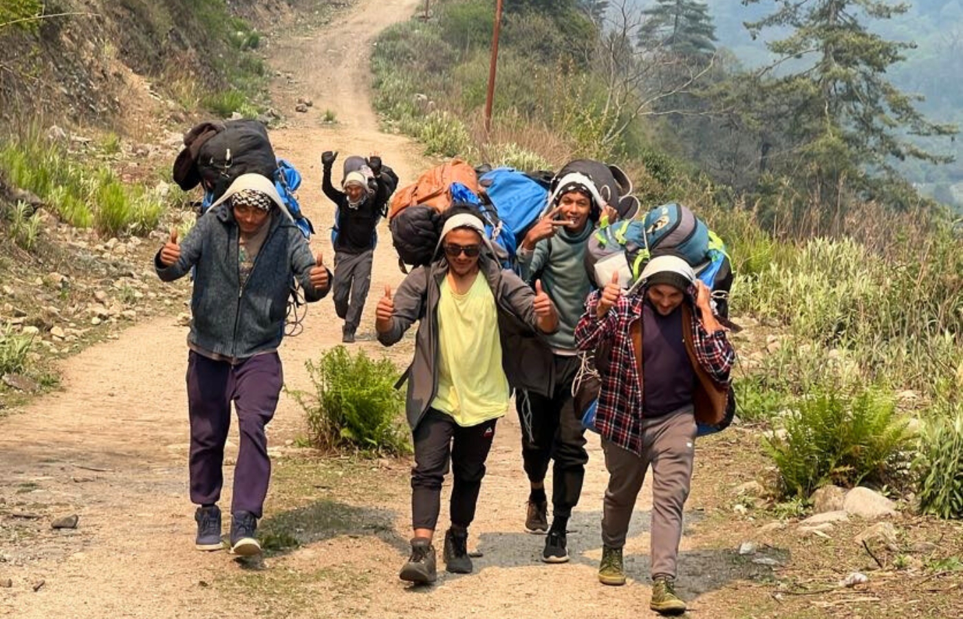 Porters Carrying Duffel Bag