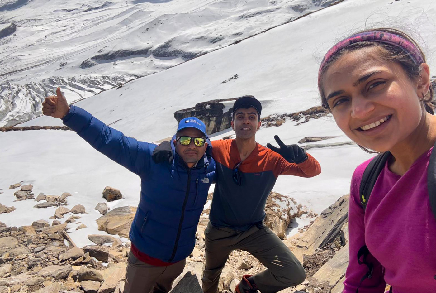 Government licensed trekking guide from Nepal Hiking Team with trekkers in Nepal Himalayas