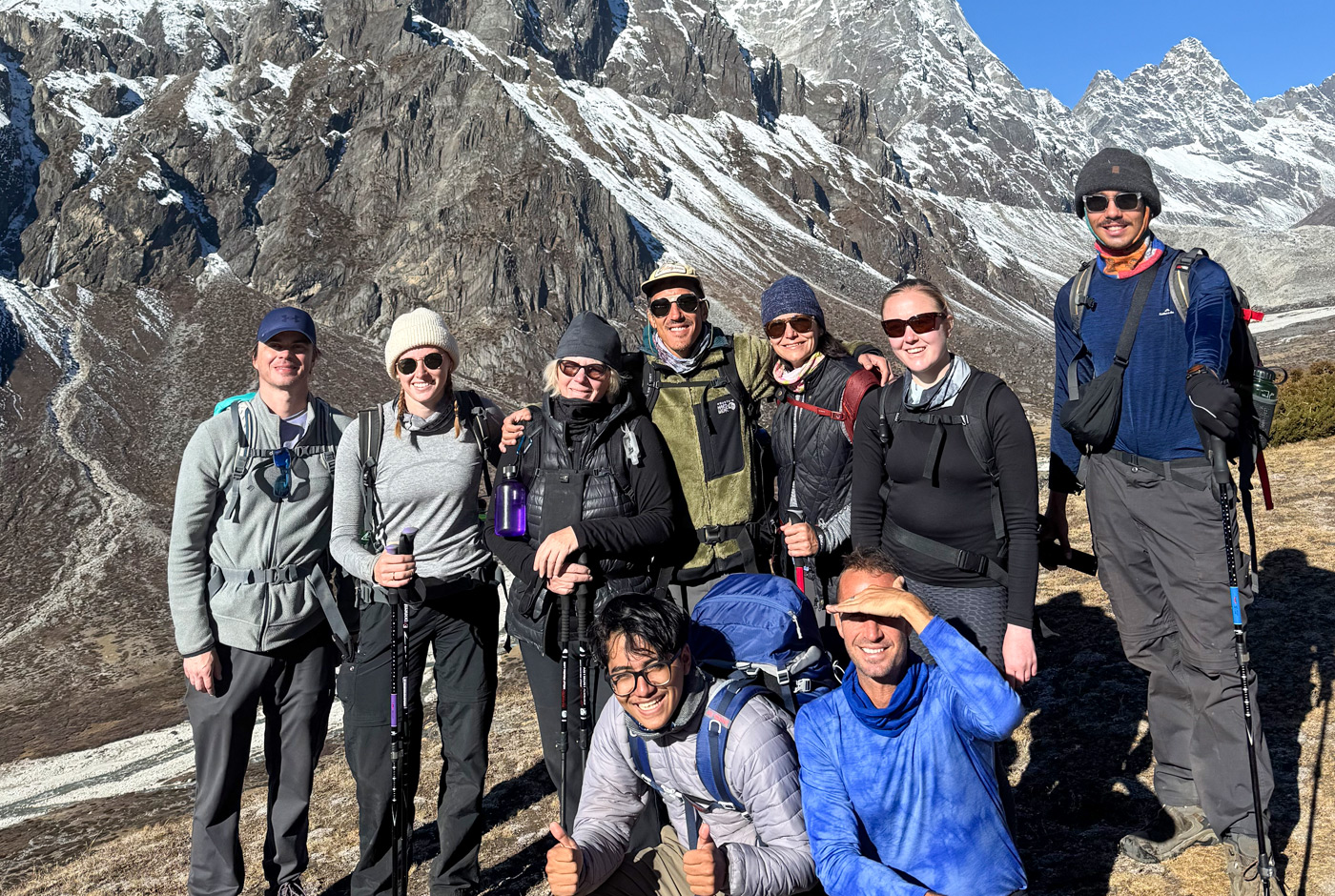 Group of trekkers walking on the high-altitude trail from Dingboche to Lobuche during the Everest Base Camp trek.