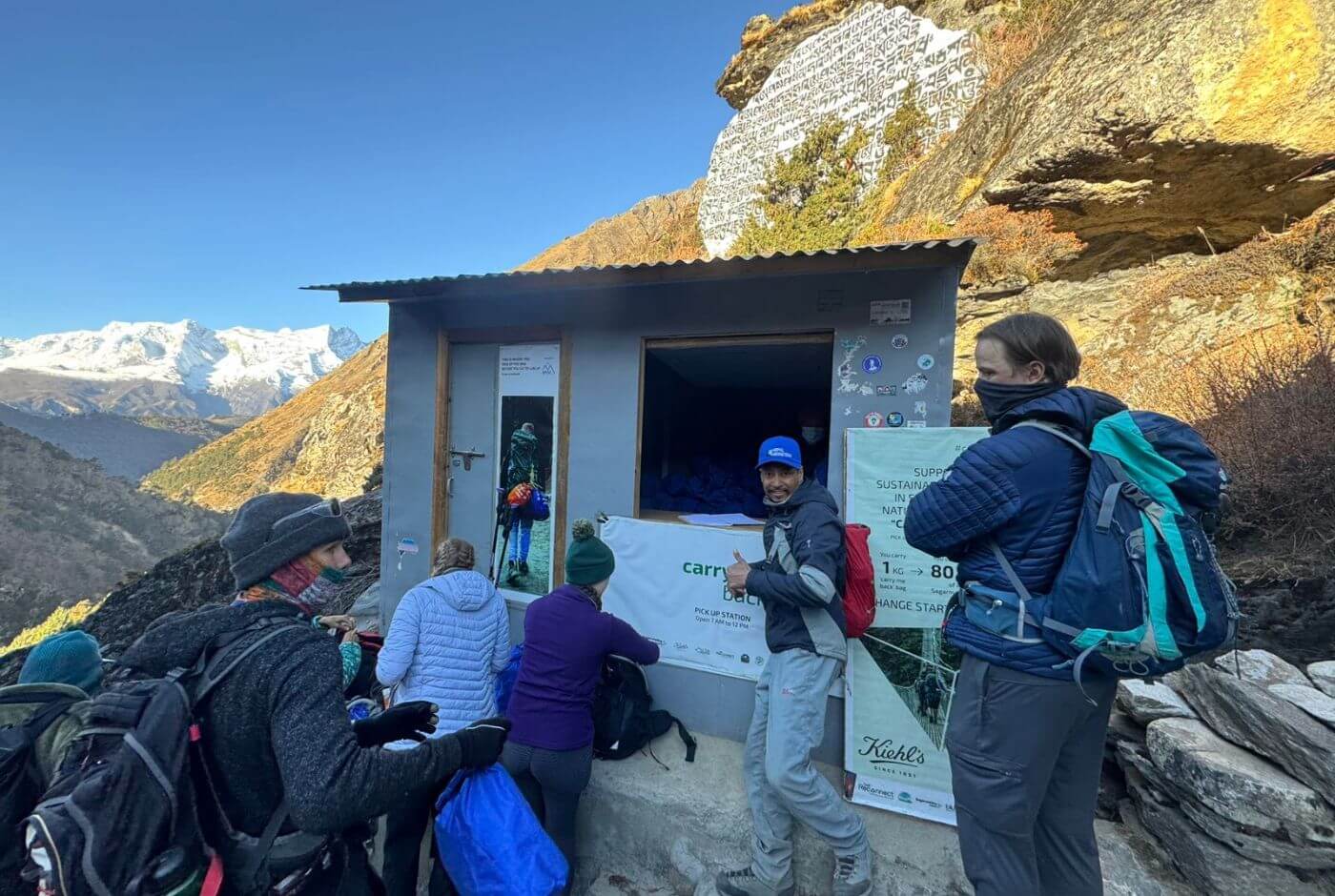 Trekkers supporting Carry Me Back initiative in Pangboche, returning waste responsibly along the Everest Base Camp trail
