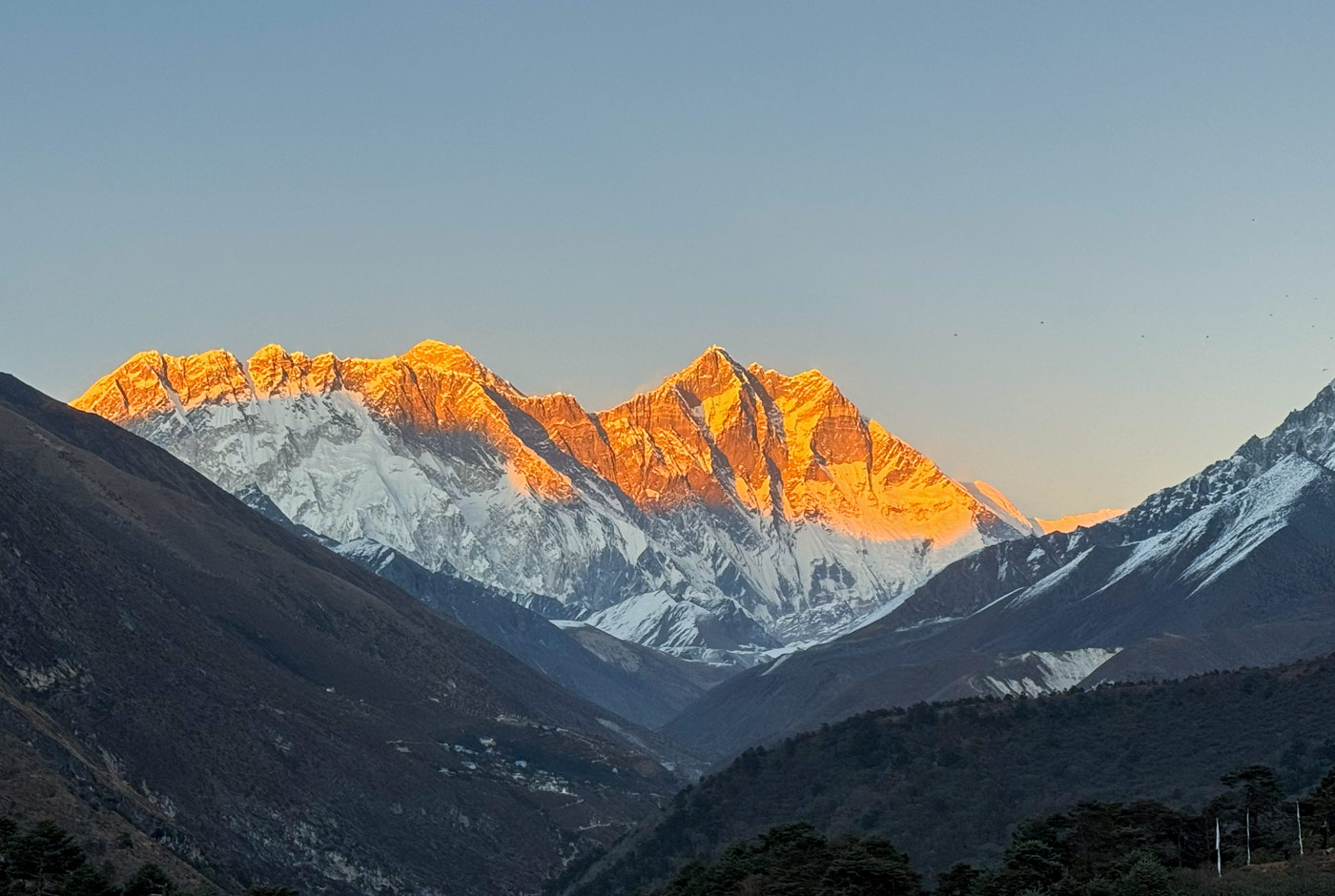 Golden sunrise view of Mount Everest and Lhotse from Tengboche village on the Everest trekking trail