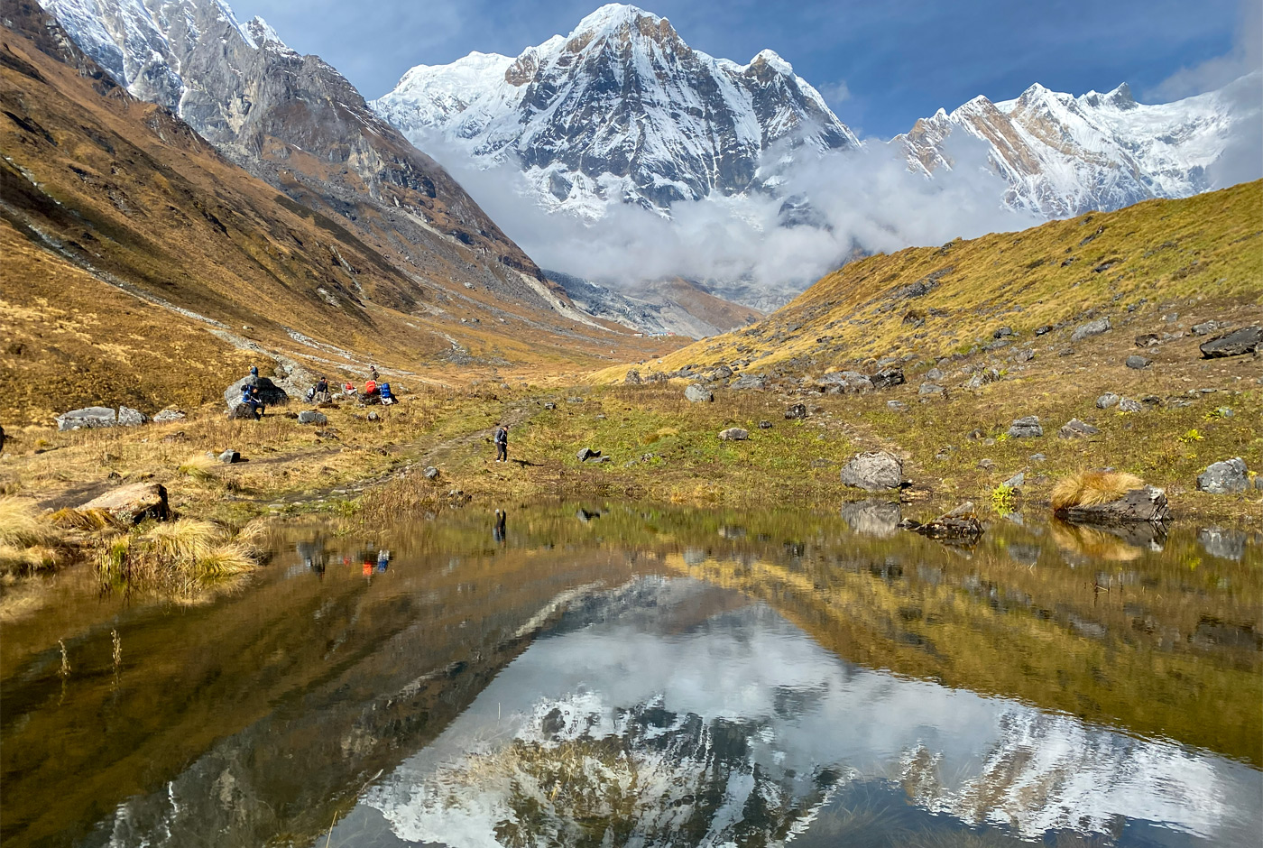 Trekkers Navigating The High Altitude Terrain Of The Annapurna Conservation Area, Nepal