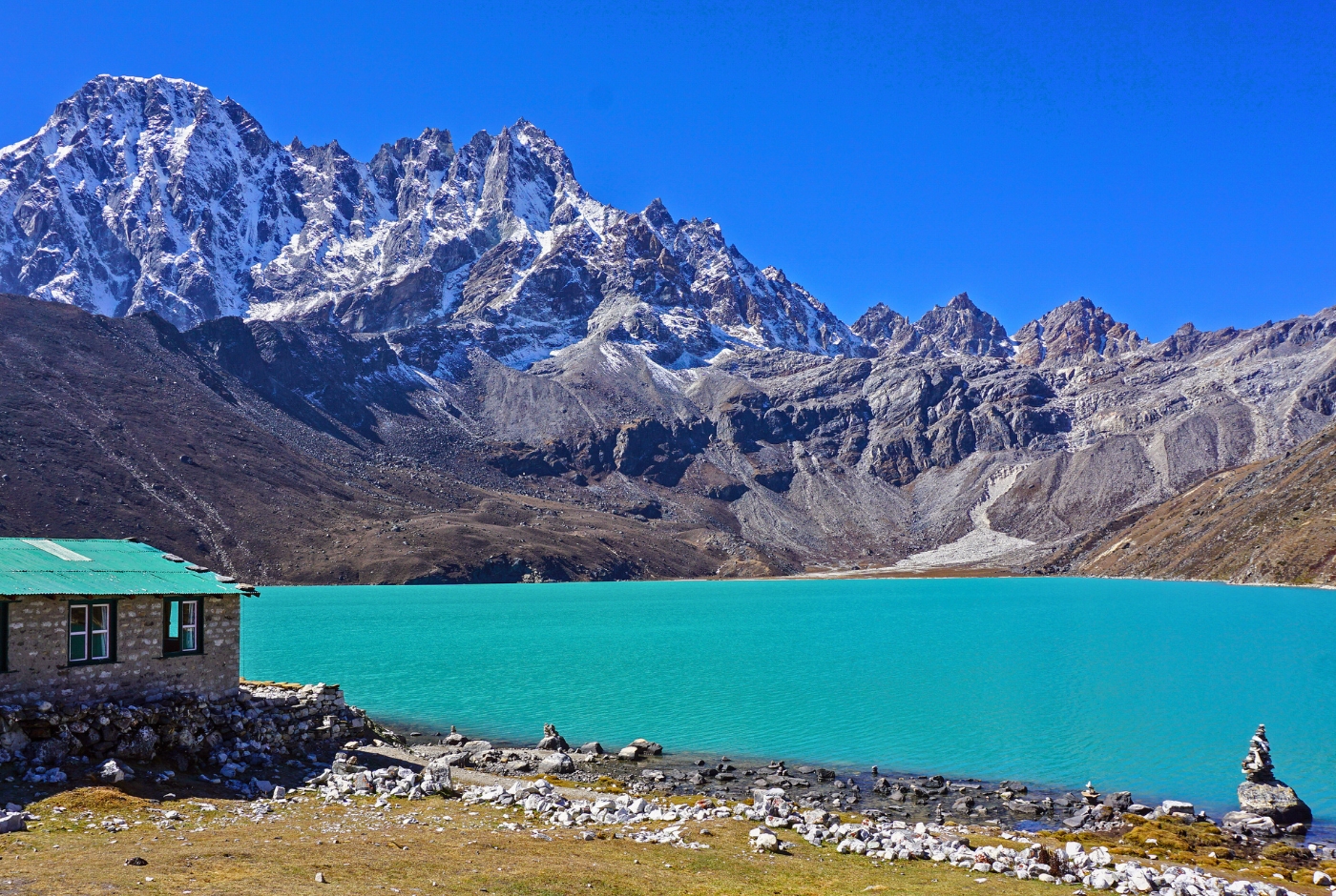 Scenic view of Gokyo Lake with surrounding mountains in the Everest region, Nepal